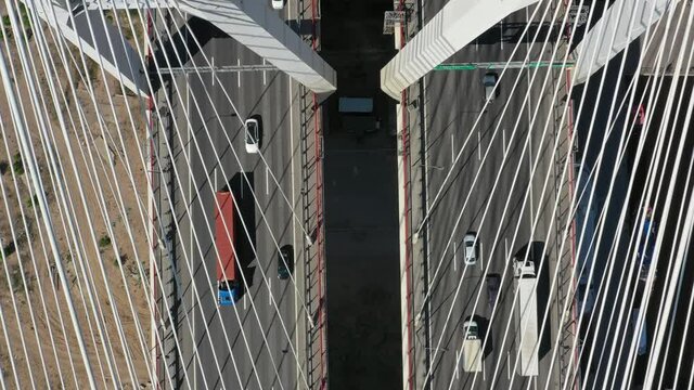 Aerial top view of cable-stayed bridge with cars in St.Petersburg, 4k