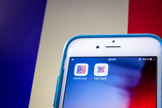 Kumamoto, JAPAN - Oct 20 2021 : TousAntiCovid and TAC Verif apps on iPhone on French flag. TousAntiCovid is a contact tracing app for monitoring the spread of the COVID-19 pandemic in France.