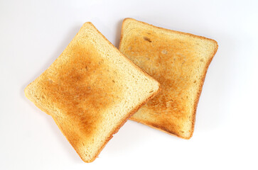 Two slices of toasted bread isolated on white