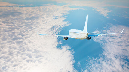 Fototapeta na wymiar White passenger airplane flying away in to sky high altitude during sunset time