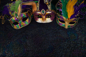 Mardi Gras Mask and colorful Mardi Gras Beads Background