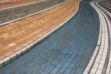 Curvy colorful mosaic pavement in Bologna Italy