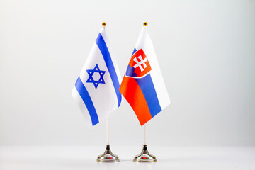 State flags of Israel and Slovakia on a light background. Flags of states.