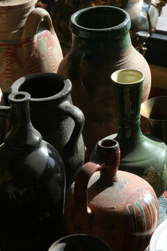old earthenware pots in the antique shop