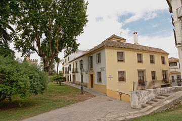 Tradtional houses along a park in Cordoba, Spain