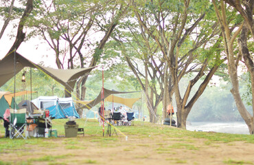 Obraz premium Camping site for people who are adventure and nature. Early summer season, traveling and family vacation in camping site.