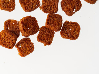 a piece of brown bread cookies on a white background