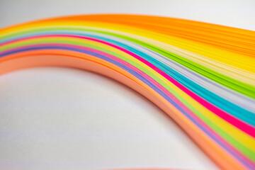 Colored paper strips, background textures, rainbow paper