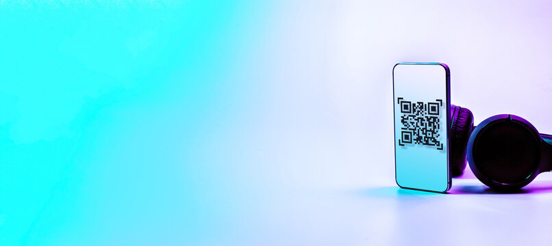 Qr code payment. Digital mobile smart phone with qr code scanner on smartphone screen for pay, scan barcode technology on neon background. Online shopping, cashless society technology concept. - Powered by Adobe