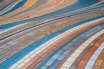 Beautiful whimsical colorful pavement tile blocks in Italy