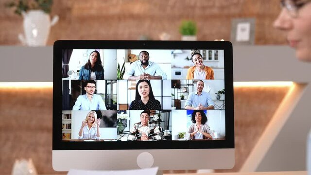 Successful creative business partners gathered in an online video conference to discuss the company's financial plans. Business man and woman talking on video call with colleagues, analyzing strategy