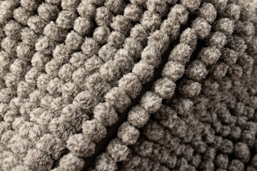 Gray chenille soft bath mat texture background. Bath Accessories. Top view.