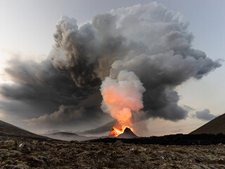 Big cloud over a volcanic eruption
