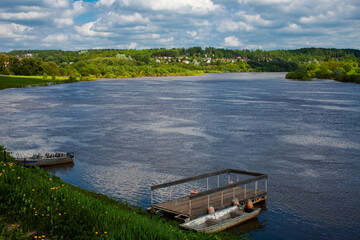 Obraz premium beautiful summer landscape view of the river, trees grow around