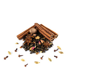 Natural green tea with small roses and spices on a white background. Tea ceremony