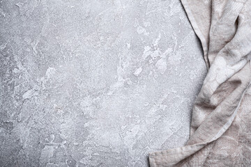 Linen napkin on grey concrete background