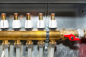 New brass manifold for underfloor heating systems with rotameters  indicate flow of 0 liters per...