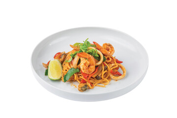 Spaghetti Tom Yum Seafood in white plate