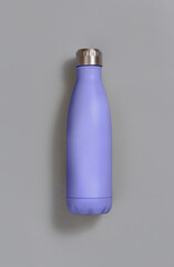 Light purple reusable insulated bottle on grey background