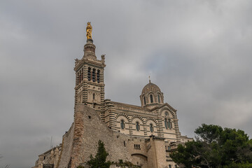 Fototapeta na wymiar Notre Dame de la Garde is Byzantine architecture basilica in Marseille