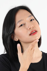 Fototapeta premium Young attractive south east asian woman pose face expression emotion on white background