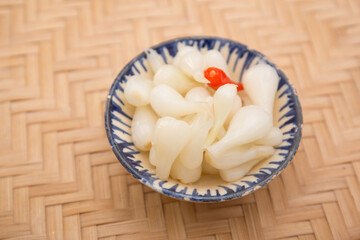 Vietnamese food for Tet holiday in spring, it is traditional food on lunar new year:  pickled small leeks, carrot - obrazy, fototapety, plakaty