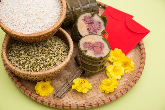 Vietnamese food for Tet holiday in spring, it is traditional food on lunar new year: Cylindric glutinous rice cake, dried shrimp, pickled small leeks,