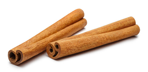 Two delicious cinnamon sticks, isolated on white background