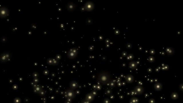 ゴールド系のパーティクルと黒背景