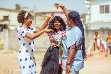 selective focus of excited african women outside- jubilation concept
