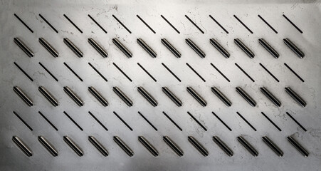Anti slip embossed metal steel plate texture. Perforated antiskid flooring, anti-slip tread panel.
