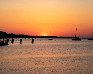 sunset at the beach, pier, harbor