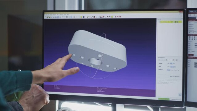 Unrecognizable designer showing 3D model of detail on computer monitor to colleague while working in modern studio