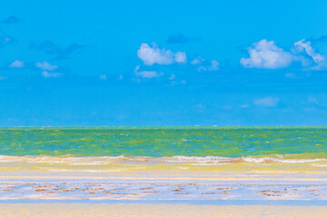 Natural Holbox island beach sandbank panorama turquoise water waves Mexico.