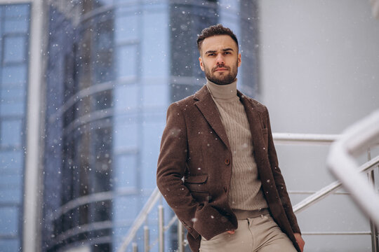 Handsome young business man outside in winter