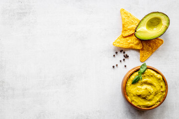 Guacamole sause with avocado and nachos chips