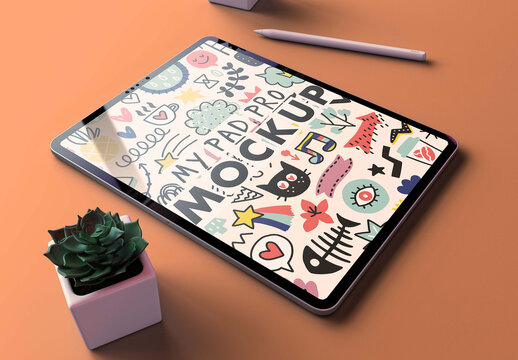 Pro Tablet Mockup on a Clean Orange Desk and Trendy Succulents Flowers