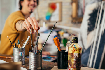 man painter working in his atelier