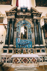 Altar of a monk with a baby in his arms, Franciscan Church of the Younger Brothers in Dubrovnik - obrazy, fototapety, plakaty