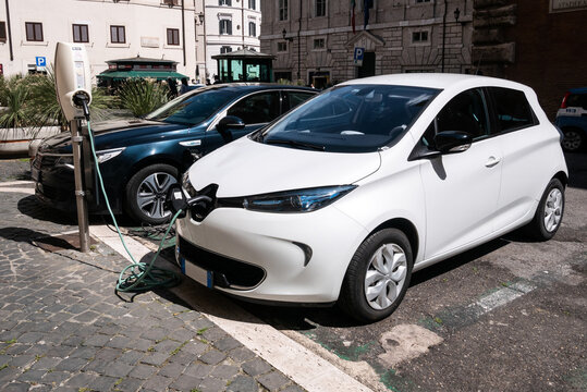 Charging modern electric cars. Kia and Renault plug-in vehicles at the car charging station on June 1, 2020 in Rome, Italy.