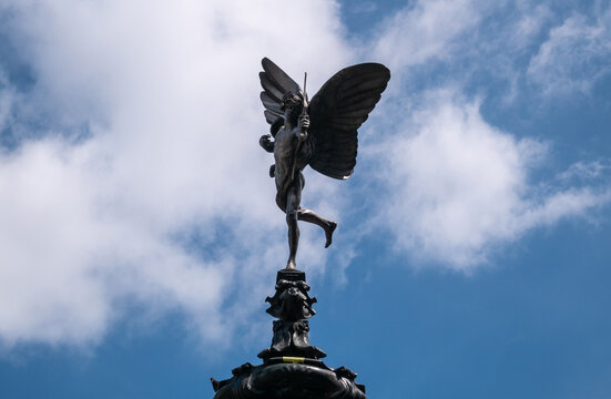 Winged statue of Anteros at the Shaftesbury Memorial Fountain (Eros), by artist Alfred Gilbert. Piccadilly Circus in London, England, United Kingdom.