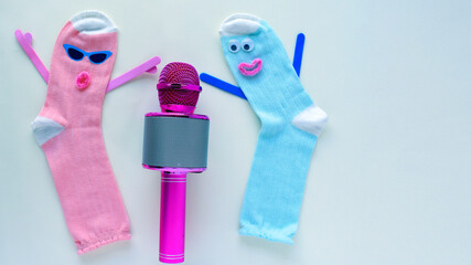 funny colorful socks singing on the mic, handmade craft for children