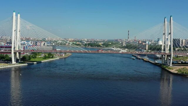 Aerial view of cable-stayed bridge with cars in St.Petersburg, 4k