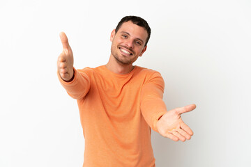 Brazilian man over isolated white background presenting and inviting to come with hand