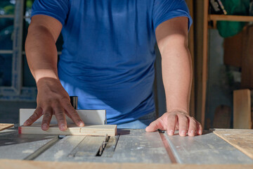 latin man working in a wood workshop