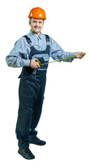 isolated. a man in overalls and a helmet is ready to take measurements. friendly builder smiles and looks at the camera