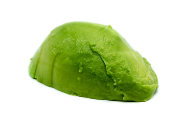 Peeled avocado isolated on white background