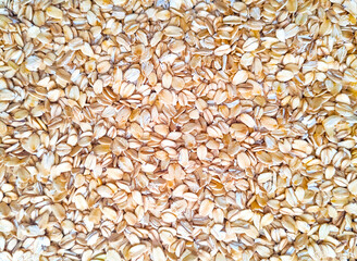 Oatmeal background. Healthy food. Flakes for breakfast.