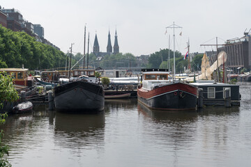Fototapeta premium View over the Westerdok water in the city center of Amsterdam