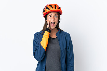 Young cyclist brazilian girl isolated on white  background with surprise and shocked facial expression
